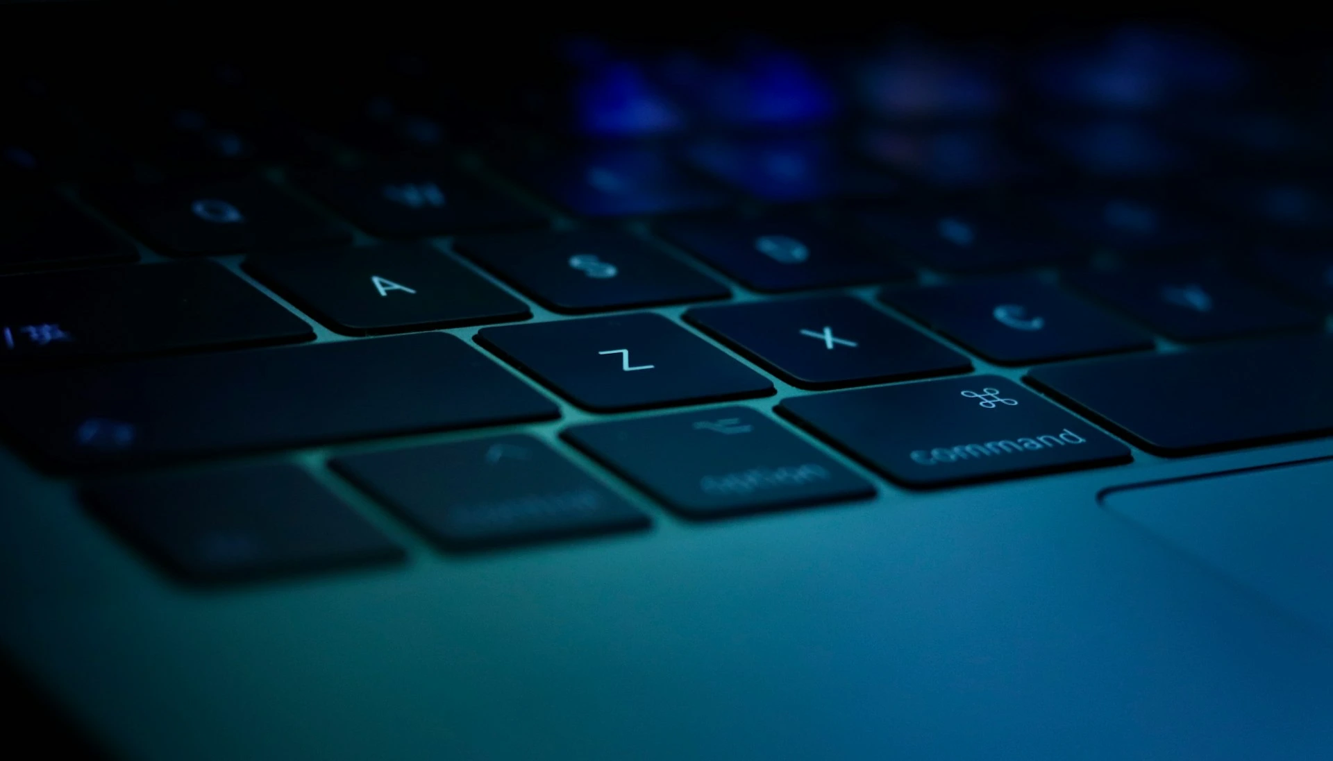 blue and black laptop computer